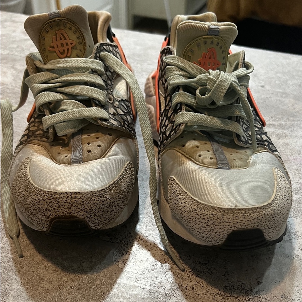 Nike Athletic Shoes with Gray and Orange Accents